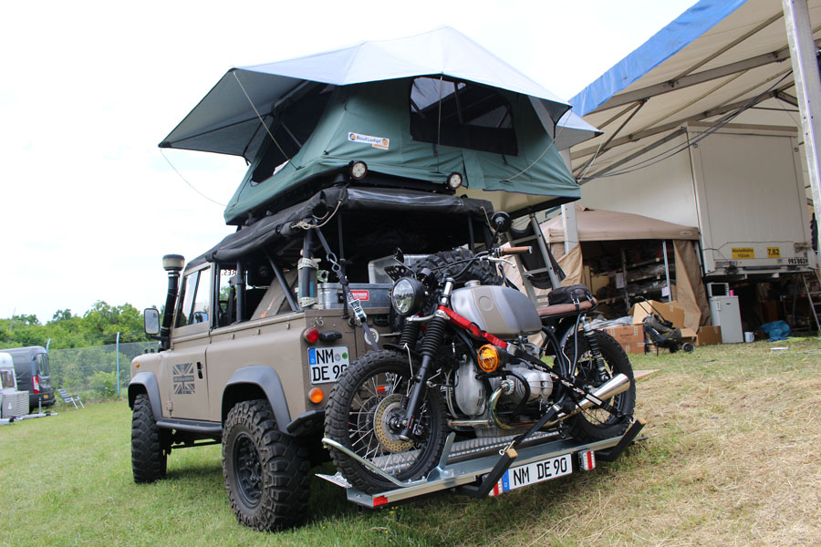 LAND ROVER DEFENDER SOFT TOP 90 Simply called Sandy Alex has been building his pride and joy since purchasing this ex MOD relic in 2012. With a recently installed 300tdi engine, new suspension and rear axel this gem has plenty of touring miles to undertake across Europe